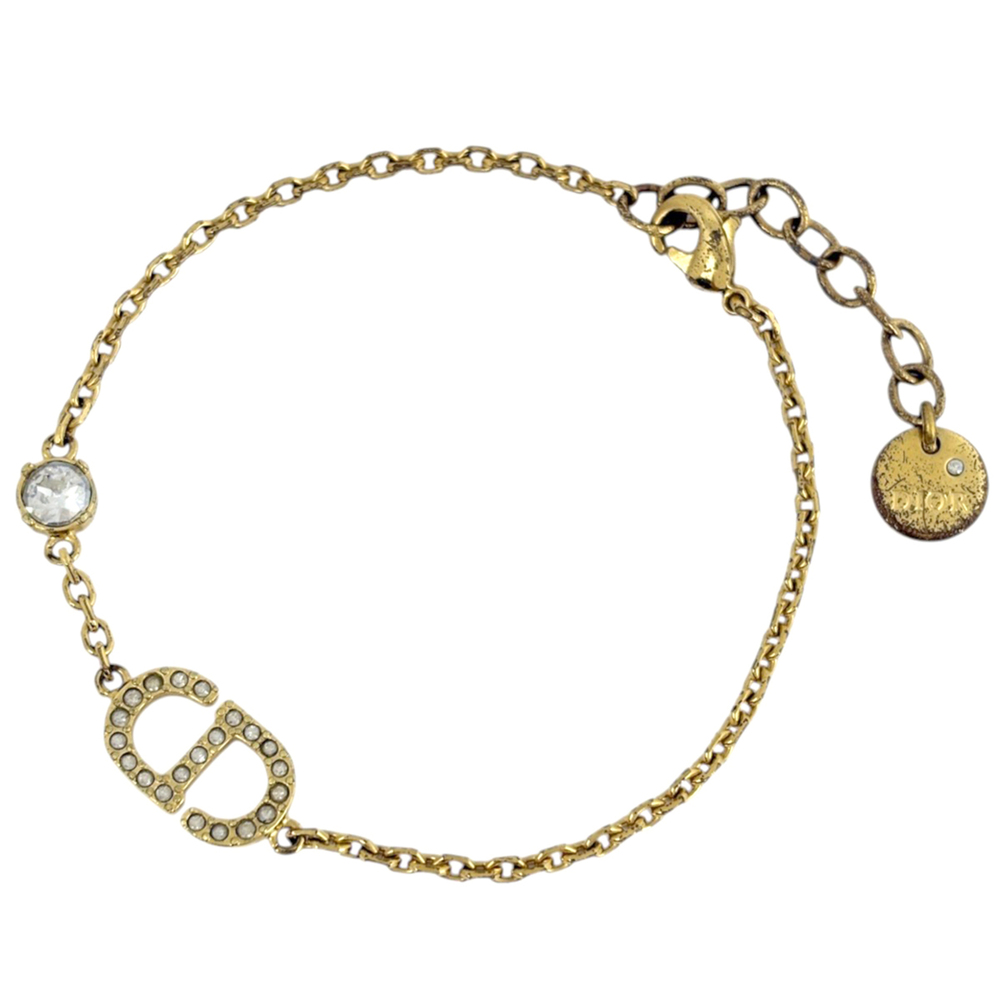 Christian Dior bracelet, gold with rhinestones, for women.